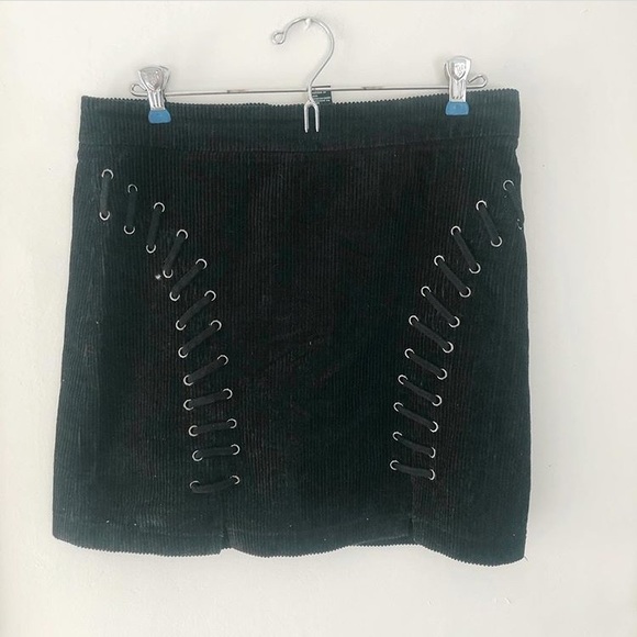 Forever 21 Dresses & Skirts - Black corduroy mini skirt with lace up detail